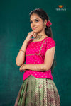 Green Mugil Mozhi Traditional Pattu Pavadai Set for Girls