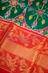 Red and Green Pochampally silk saree With ikat weaves and Floral zari woven border !!!