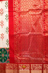 Red and Green Pochampally silk saree With ikat weaves and Floral zari woven border !!!