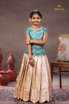 Peach Brocade Wave Traditional Pattu Pavadai Set for Girls