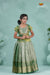 Traditional Pattu Pavadai For Girls in Green Mango Scarlet Alpha