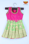 Girl Green Banarasi Patola Baby Frock 